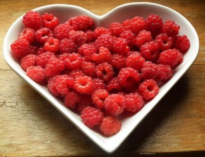 fruit can give infant digestive discomfort - raspberries in a heart